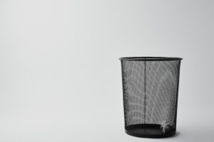 Blog 4 office trash bin with crumpled paper on white 2024 11 18 13 19 03 utc